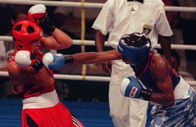 Mayweather hammers Bakhtiyar Tileganov 1996 in Atlanta. Mayweather went on to win the preliminary bout.